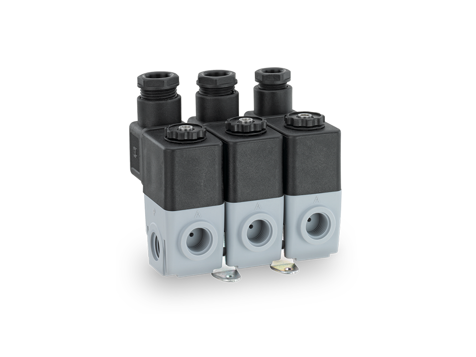 Compact pilot valve with black actuator and white valve body for precise control of pneumatic systems in industrial applications.